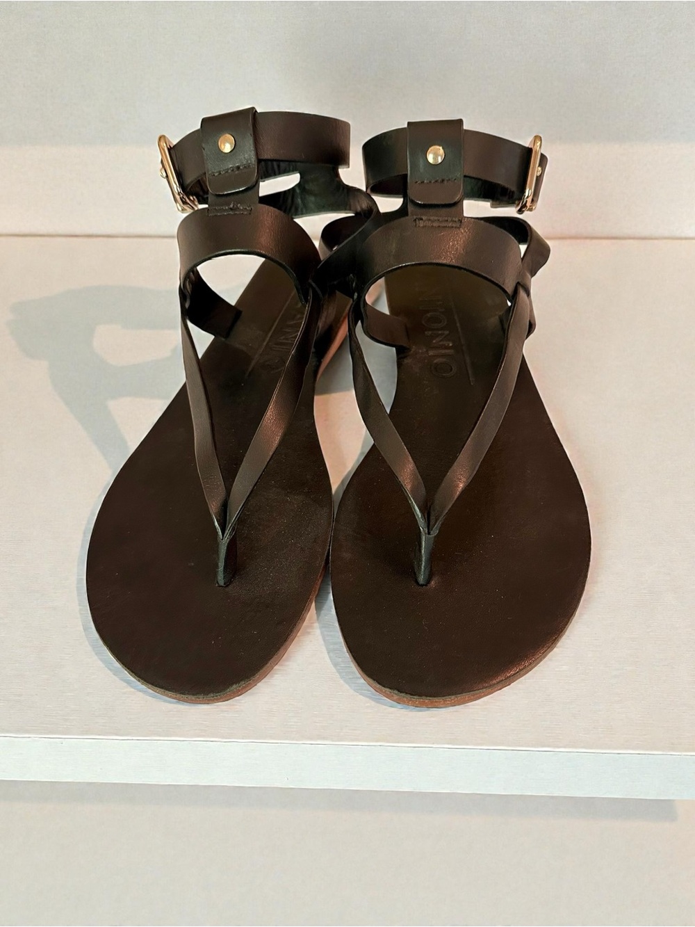ANTONIO MELANI Black Leather Thong Sandals with Ankle Strap & Gold Buckles